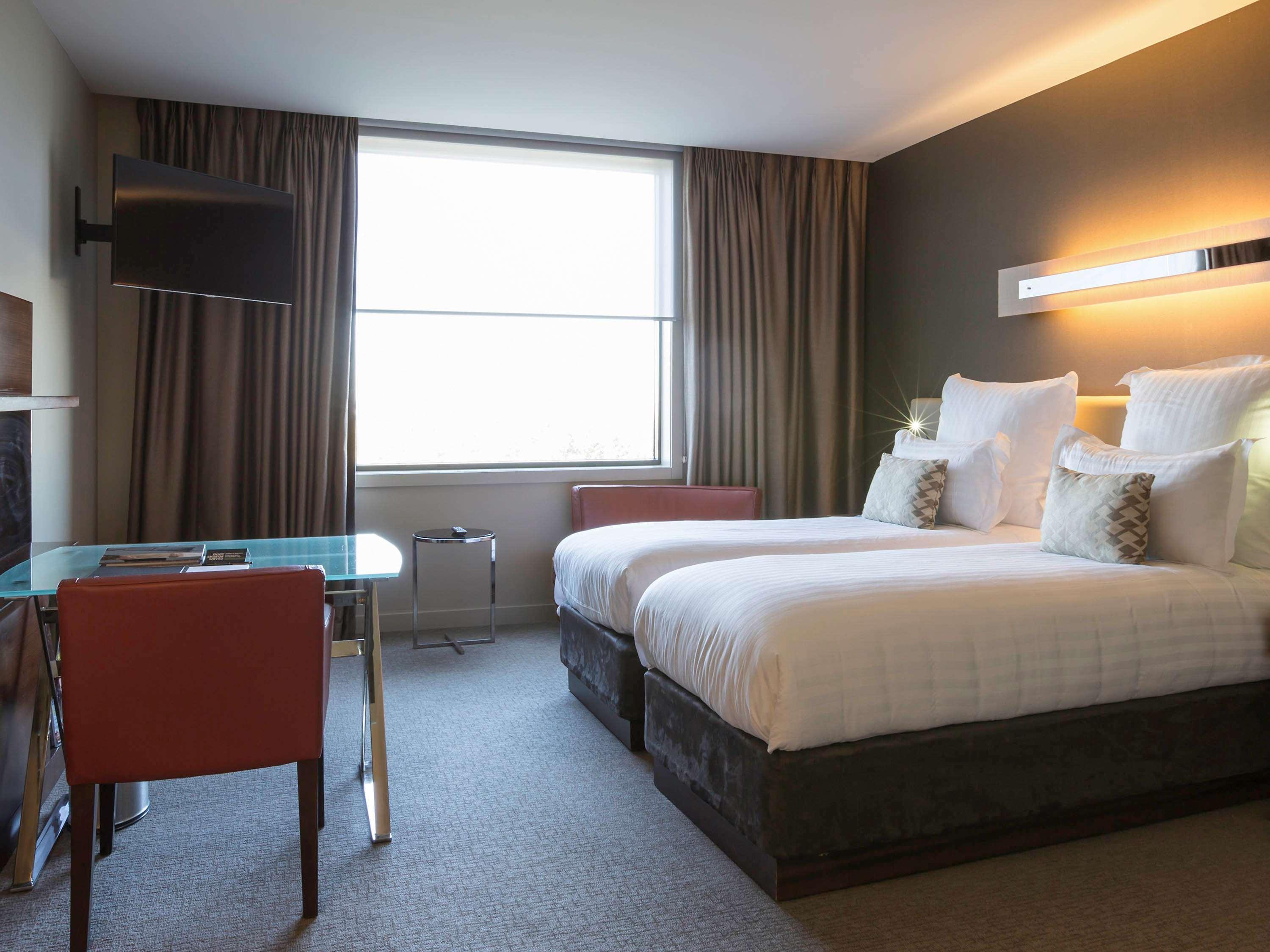 Pullman Sydney Olympic Park Hotel Exterior photo A room at the hotel