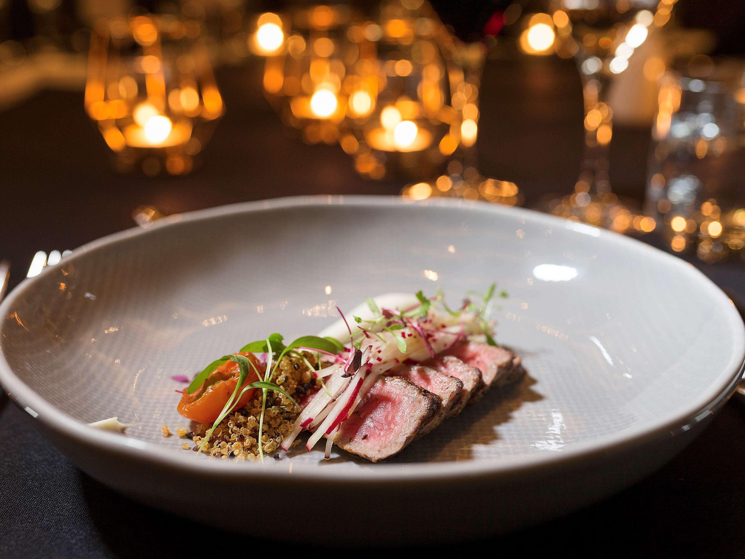 Pullman Sydney Olympic Park Hotel Exterior photo A dish at the restaurant