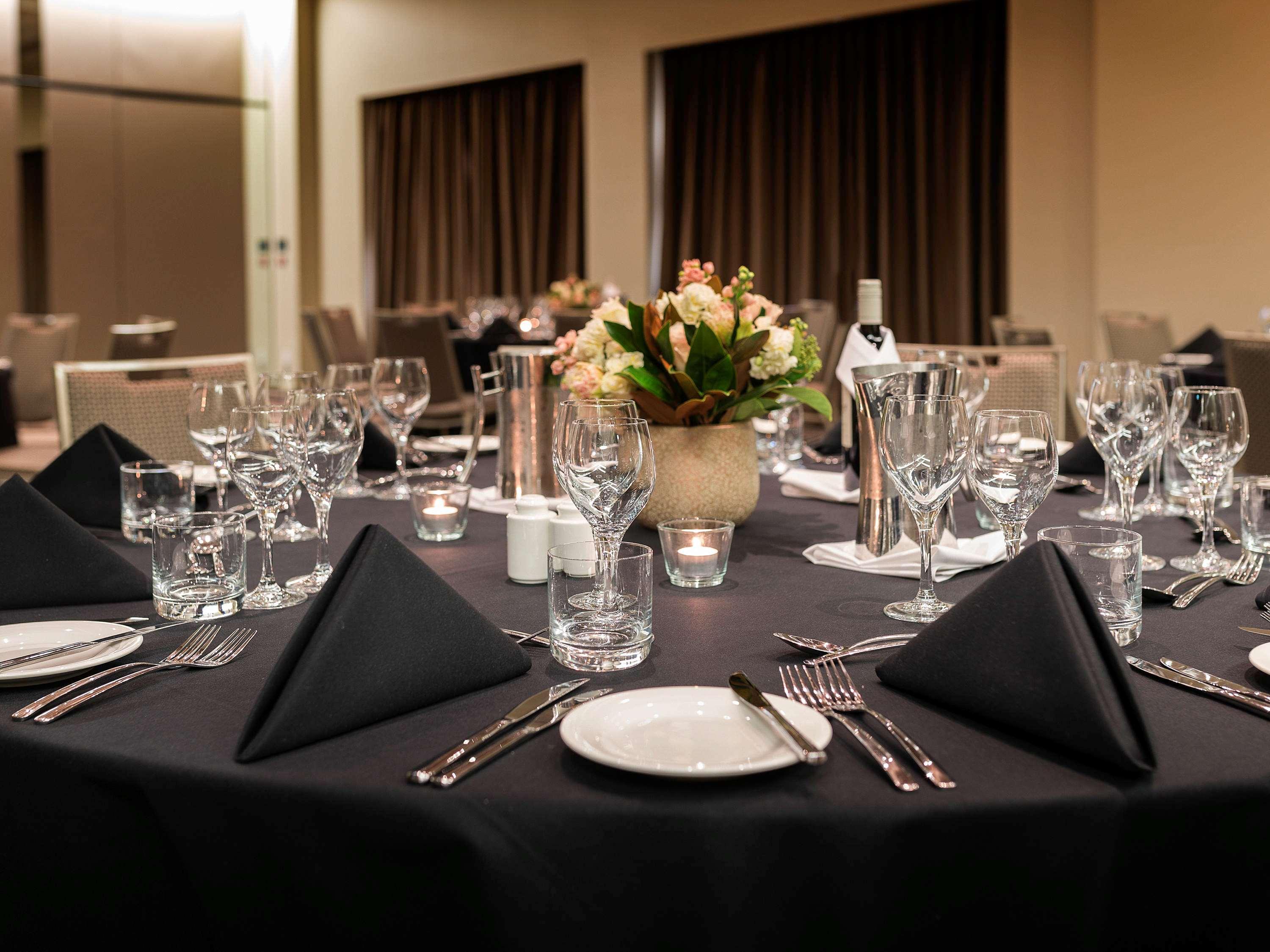 Pullman Sydney Olympic Park Hotel Exterior photo A table set for a formal dinner