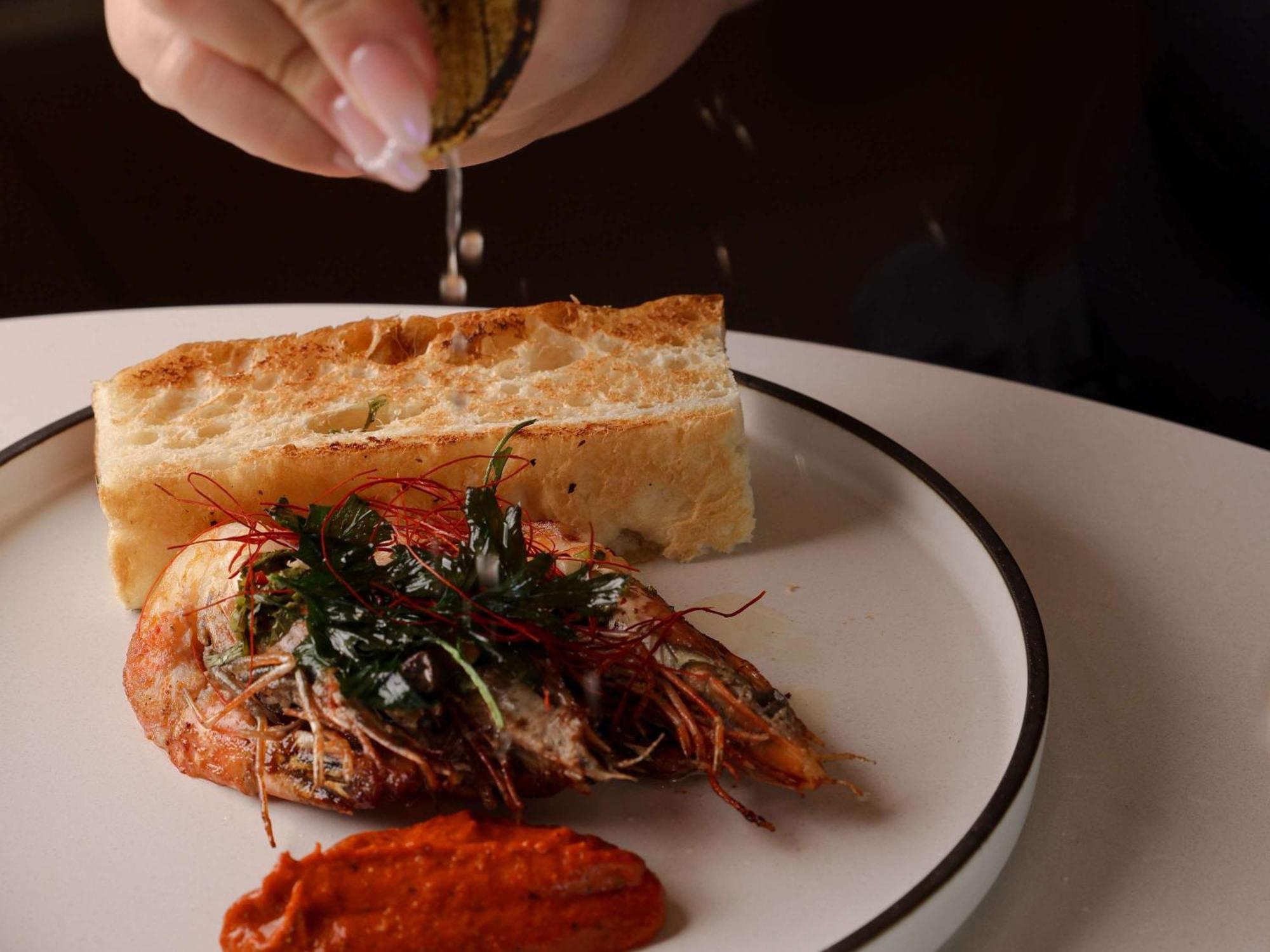 Pullman Sydney Olympic Park Hotel Exterior photo A prawn and bread dish